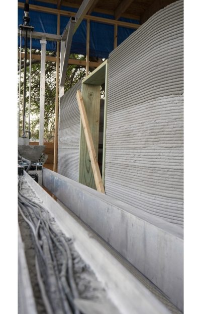 Close up of  exterior view of concrete 3-d printed home in Austin Texas