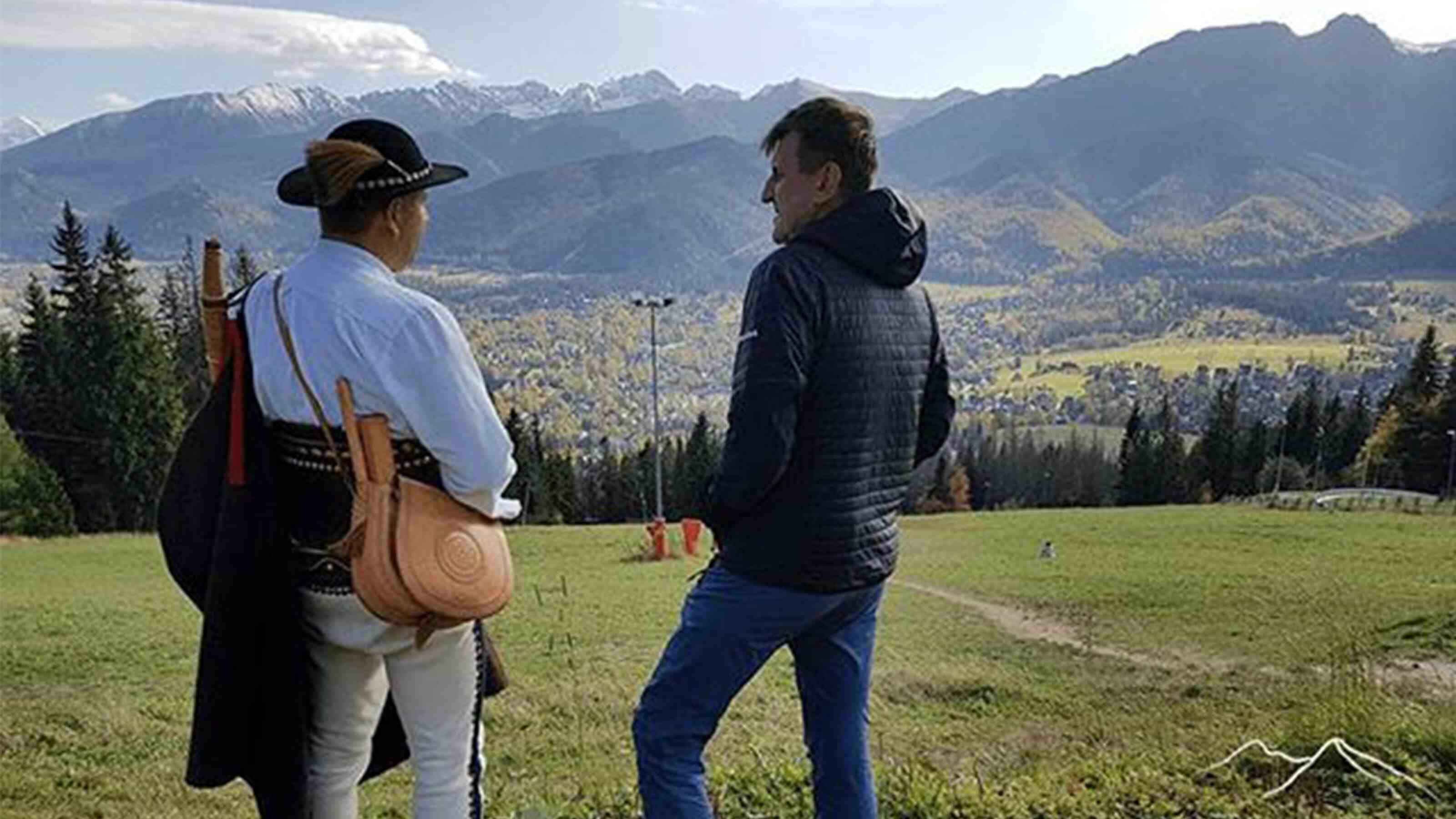 Marek Kaminski chatting with a local on his expedition.