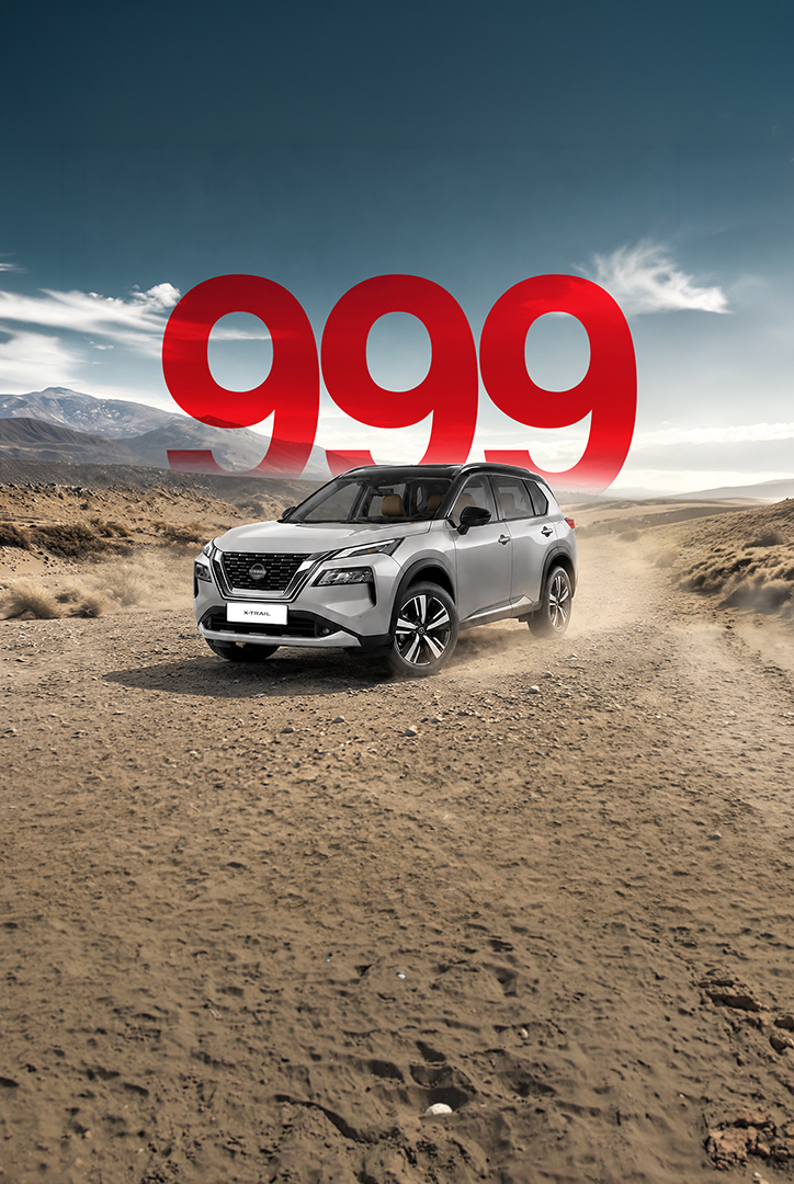Nissan X-Trail with festive night backdrop