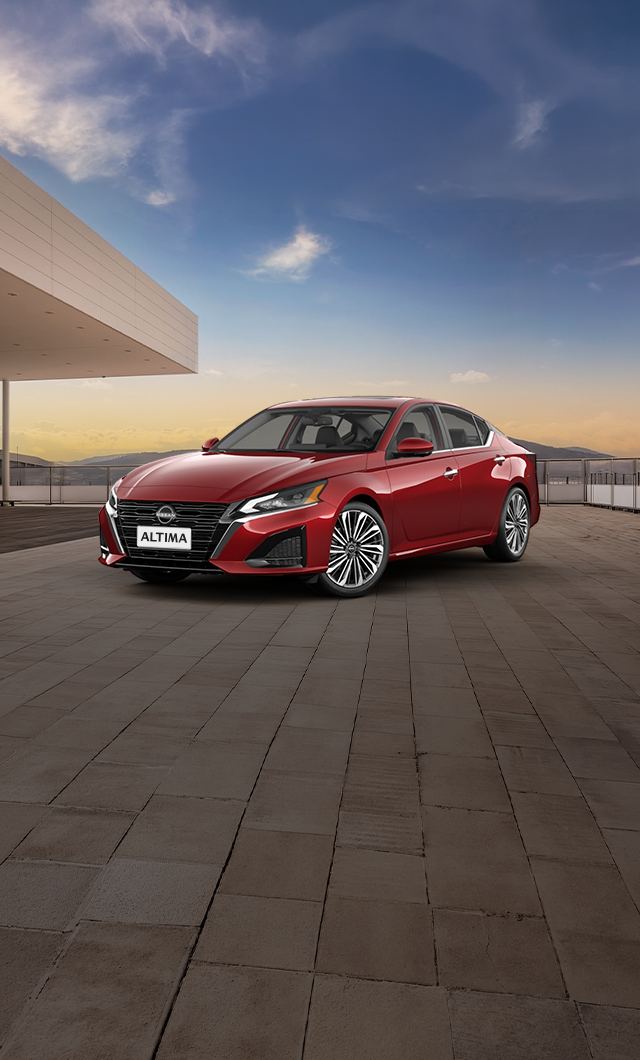 Nissan Altima with festive night backdrop